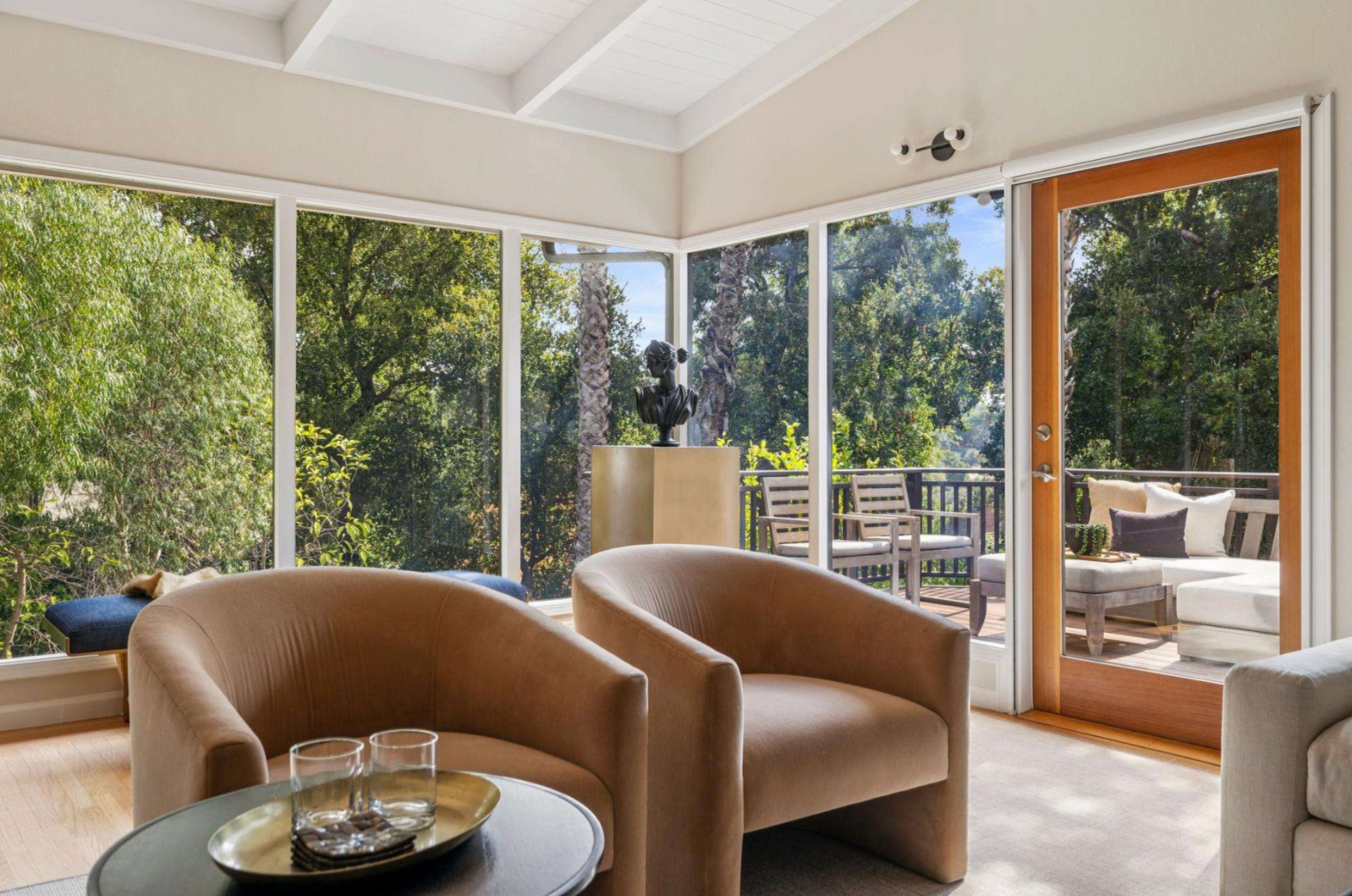 1297 Sunnyhills Road — Stone fireplace with beamed ceiling and graceful stair entry