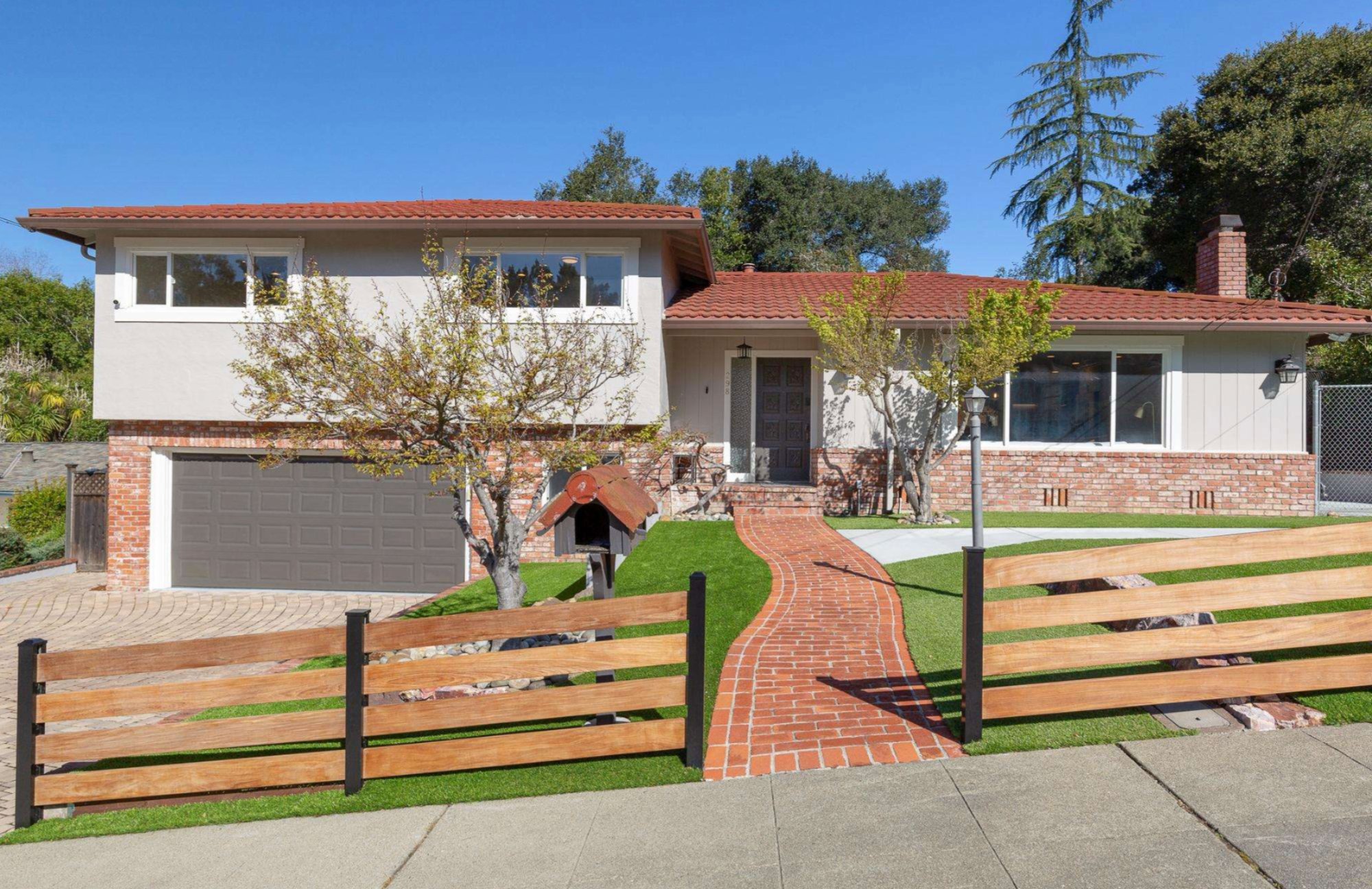 298 Elysian Fields Drive — Front exterior with brick pathway and mature landscaping
