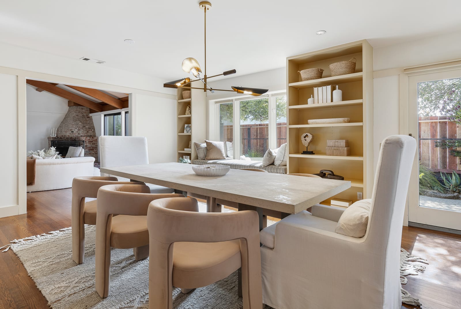 22 Kensington Court — dining room with built-in shelving, window seat and garden door